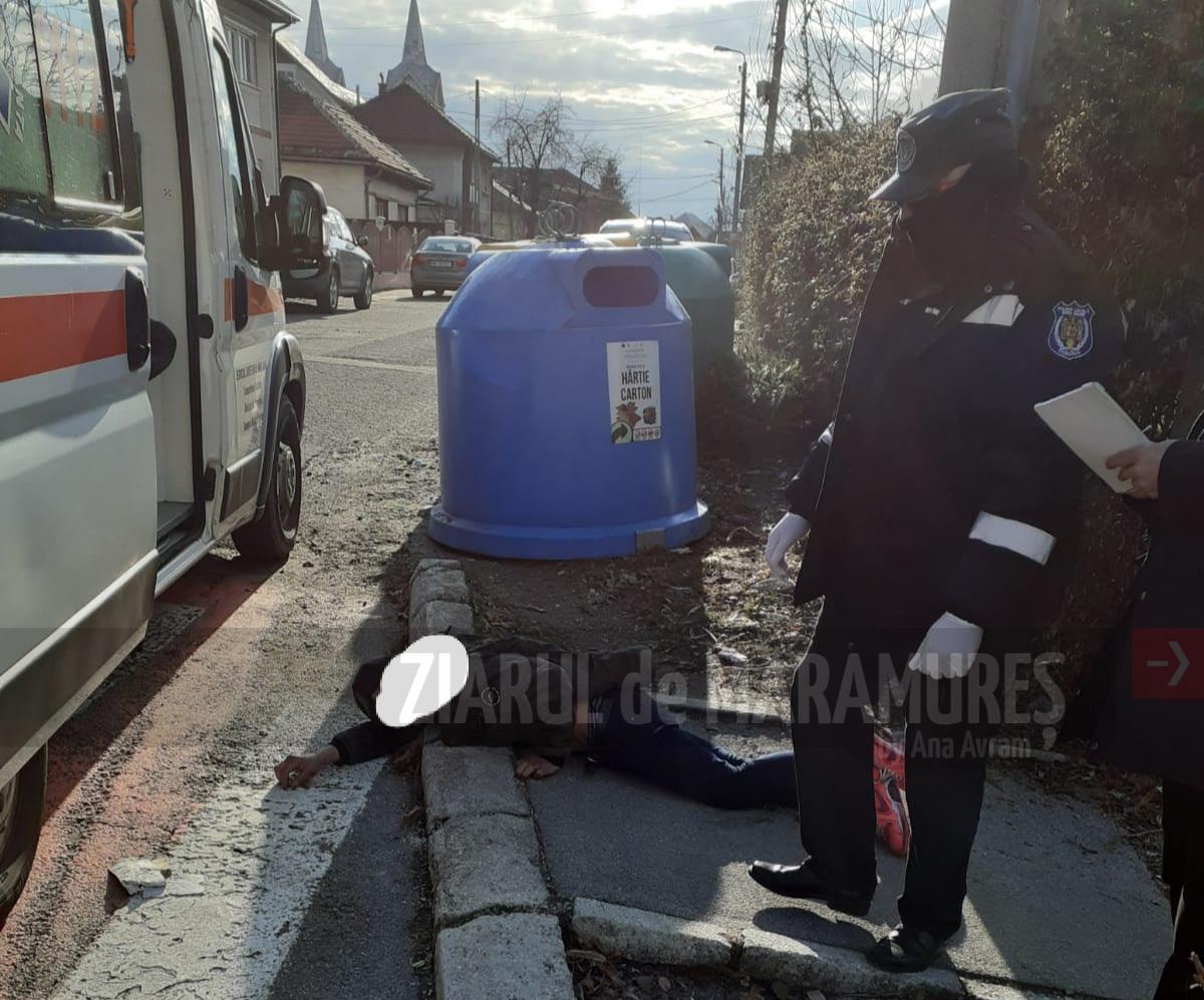 FOTO-Bărbat căzut pe caldarâm în zona străzii Cosașilor din Baia Mare. Polițiștii locali au intervenit