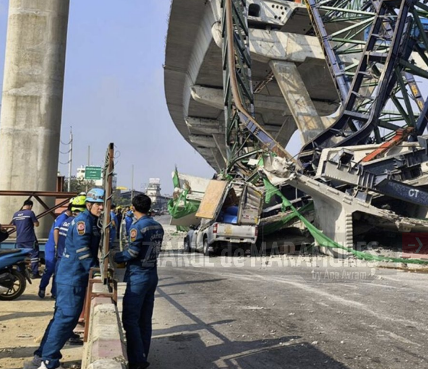 Două persoane decedate după ce o macara s-a prăbusit în Thailanda pe un drum numit Rama 2